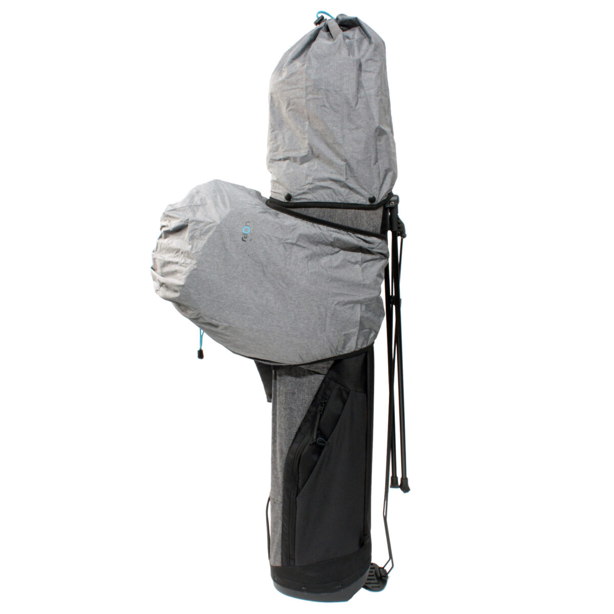 The Raon Golf pack stands upright with both rain covers attached to keep the backpack and clubs dry